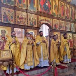Велича́ем вас,/ святи́и вси в земли́ Сиби́рстей просия́вшии,/ и чтим святу́ю па́мять ва́шу,/ вы бо мо́лите за нас// Христа́ Бо́га на́шего.